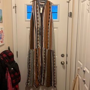 Mauve Anthropology button up maxi dress, with pockets. Size Large, but runs big